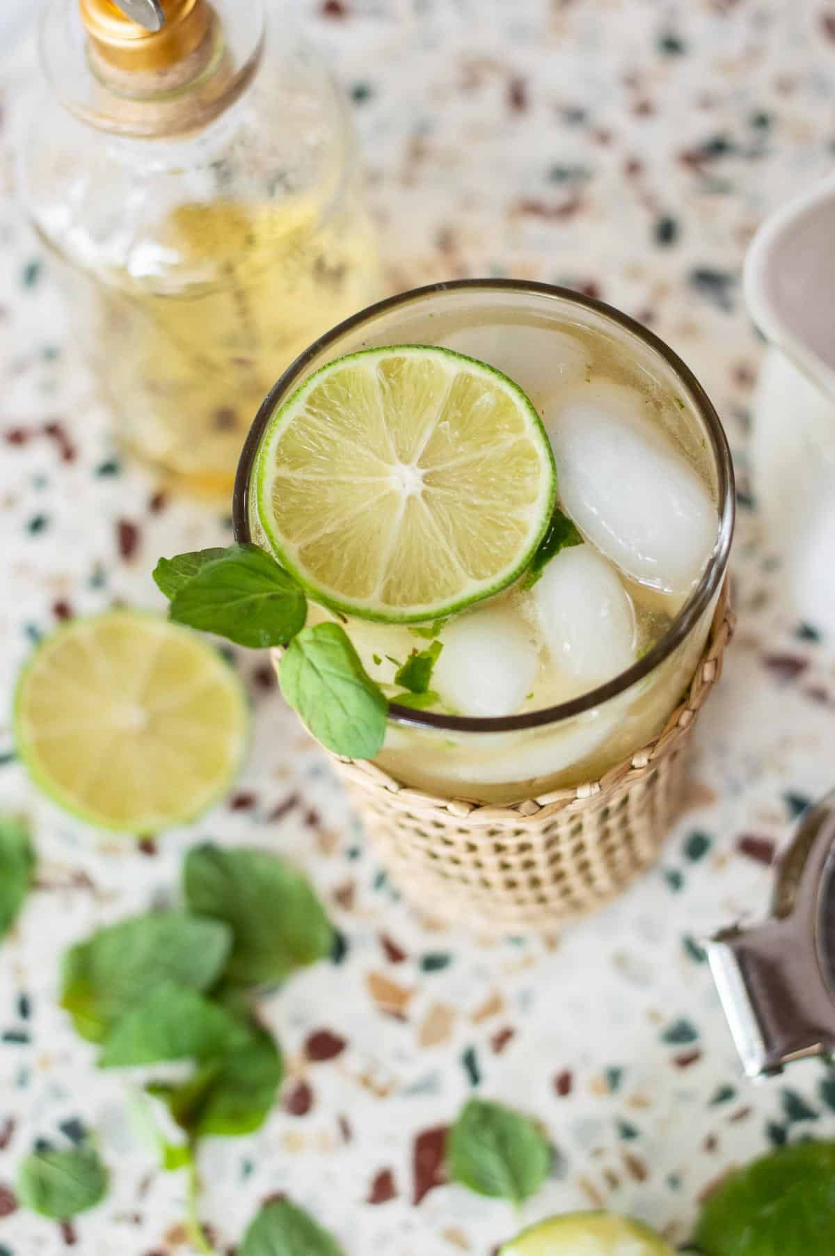 Virgin mojito mocktail in a glass with limes