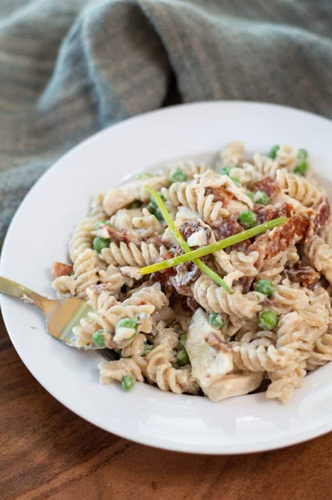 Instant Pot Chicken Pasta with Bacon and Ranch in a white bowl