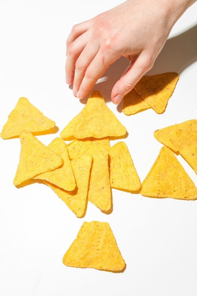 Gluten Free Chips corn triangles with hand