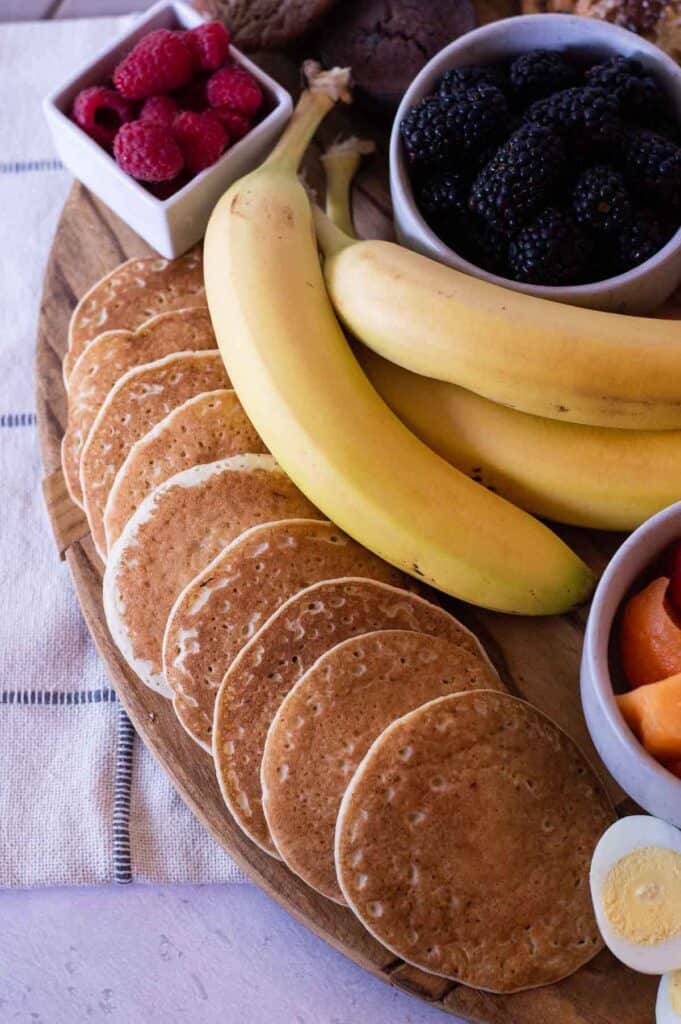 Breakfast Charcuterie Board with pancakes and bananas